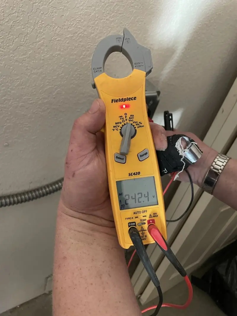 Voltage testing with clamp meter during Generator Installation in Ripley